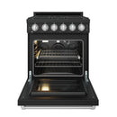 Black gas oven door open with oven cavity, racks, and interior light glow.