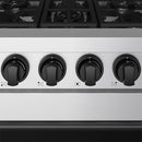 Stainless steel cooktop with four black control knobs and burner grates