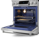Stainless gas range with oven door open, lit interior, and baking rack inside