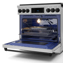 Stainless steel gas range with oven door open and lit oven cavity, black racks
