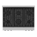 Gas range cooktop with three rows of black burner grates on stainless steel