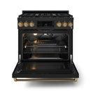Black gas range with open oven door, visible racks, and bronze control knobs
