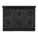 Black cooktop with six burner grates and bronze burner knobs