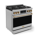 Stainless steel gas range with black oven door window, bronze knobs, and burner grates