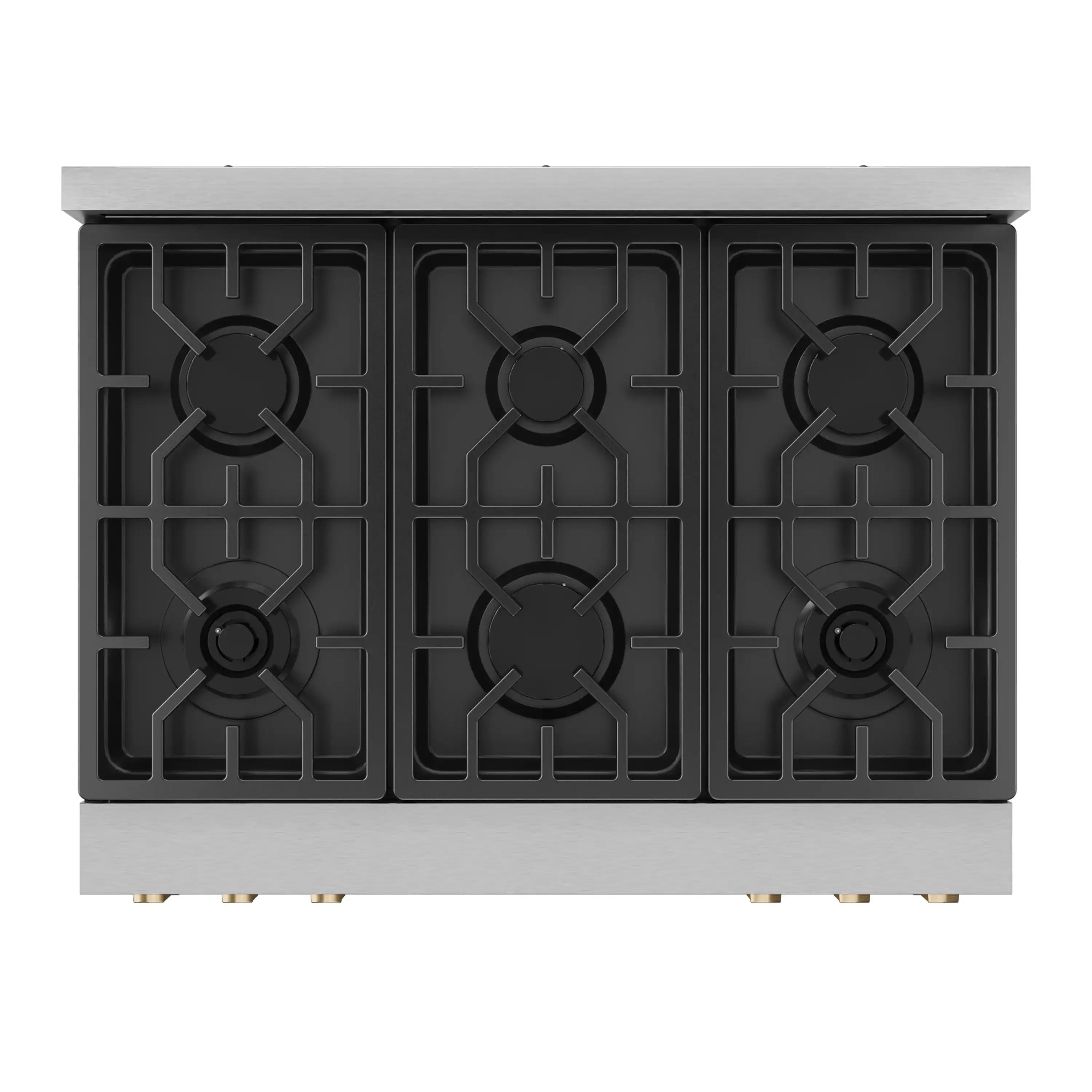Stainless steel gas range cooktop with black burner grates and bronze trim accents
