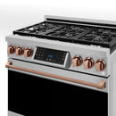 Stainless gas range with rose-gold control knobs and copper-toned oven handle, close-up