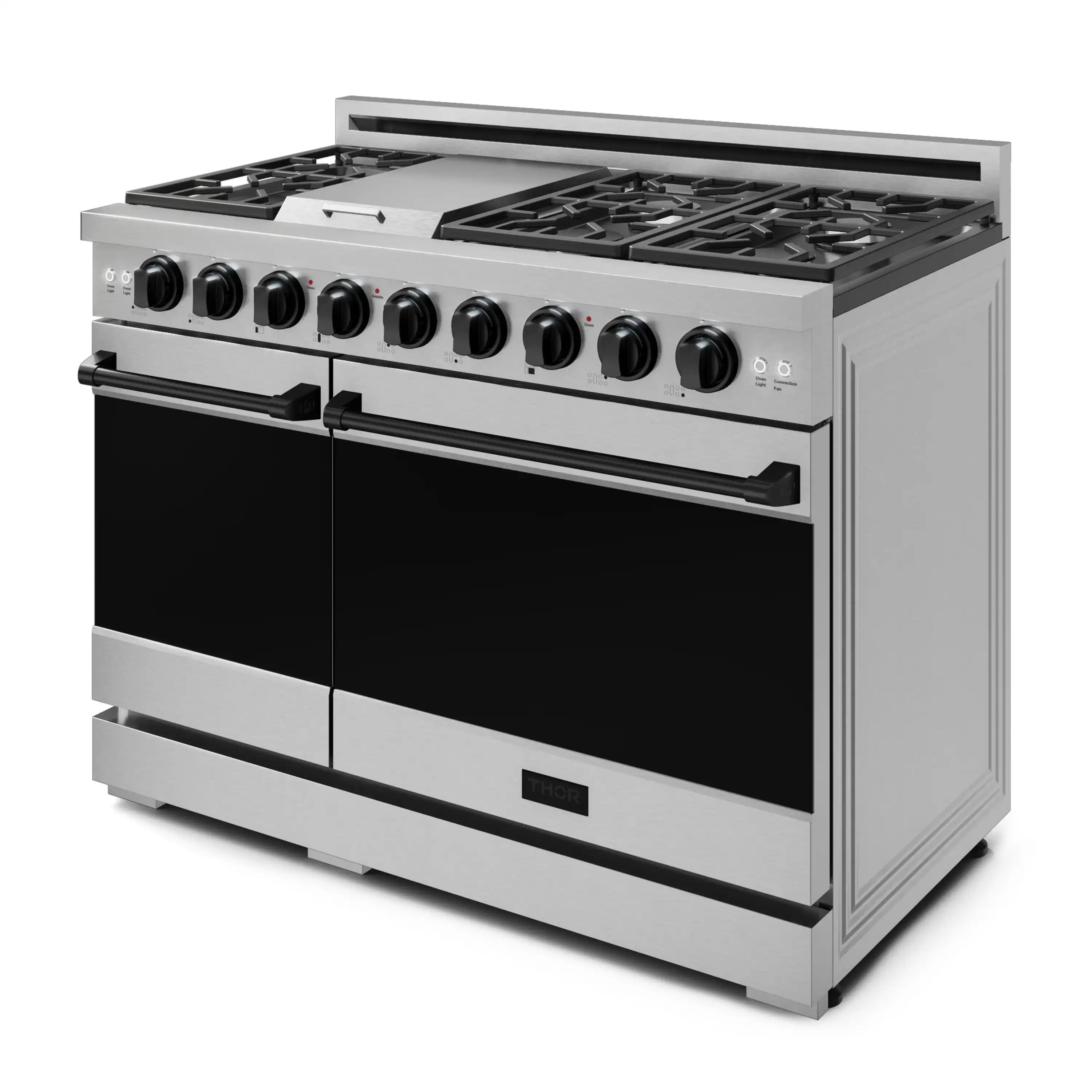 Stainless steel gas range with black oven doors and knob controls, angled view.