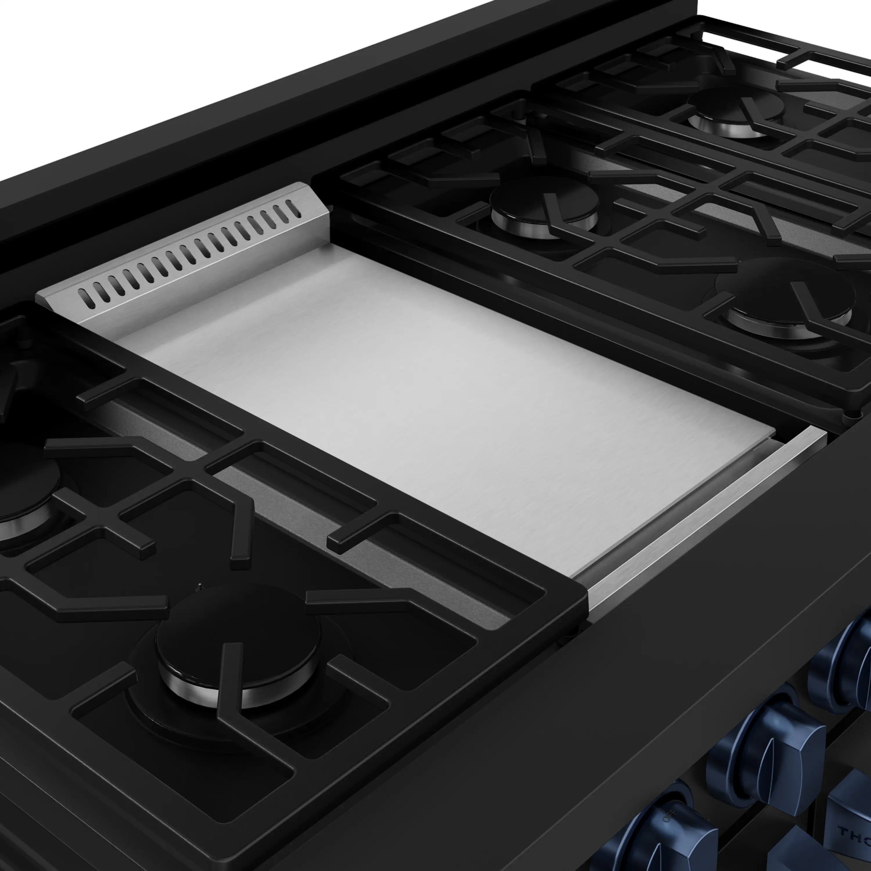 Black gas range cooktop with cast grates and large flat griddle insert
