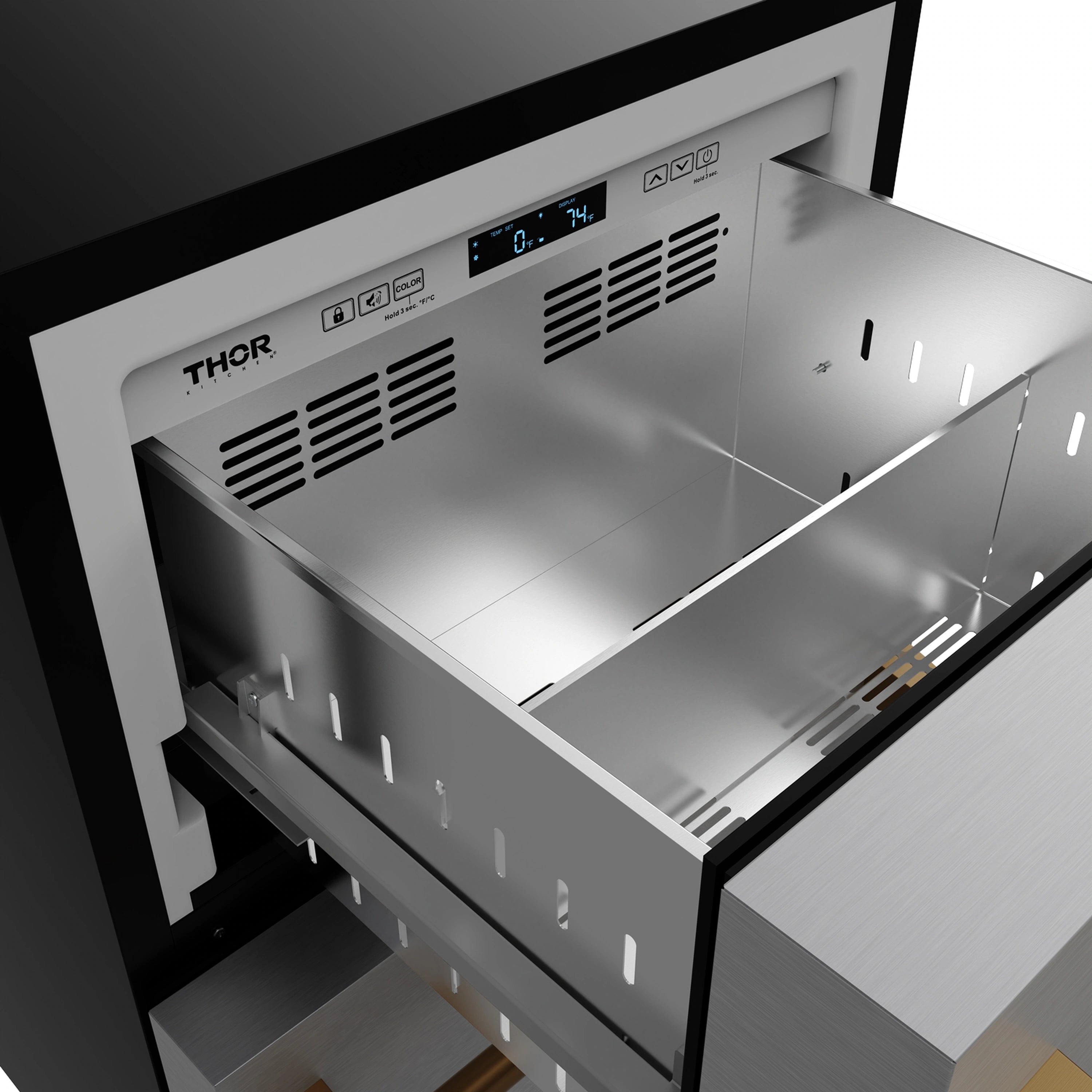 Open drawer freezer showing stainless interior trays and vented back panel
