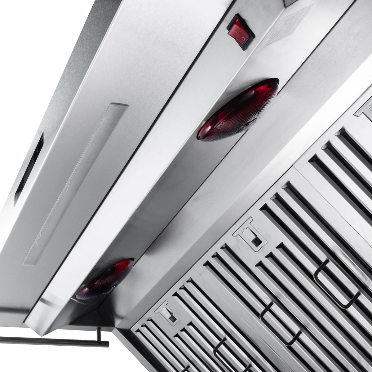 Close-up of stainless steel hood underside with red indicator lights and baffles