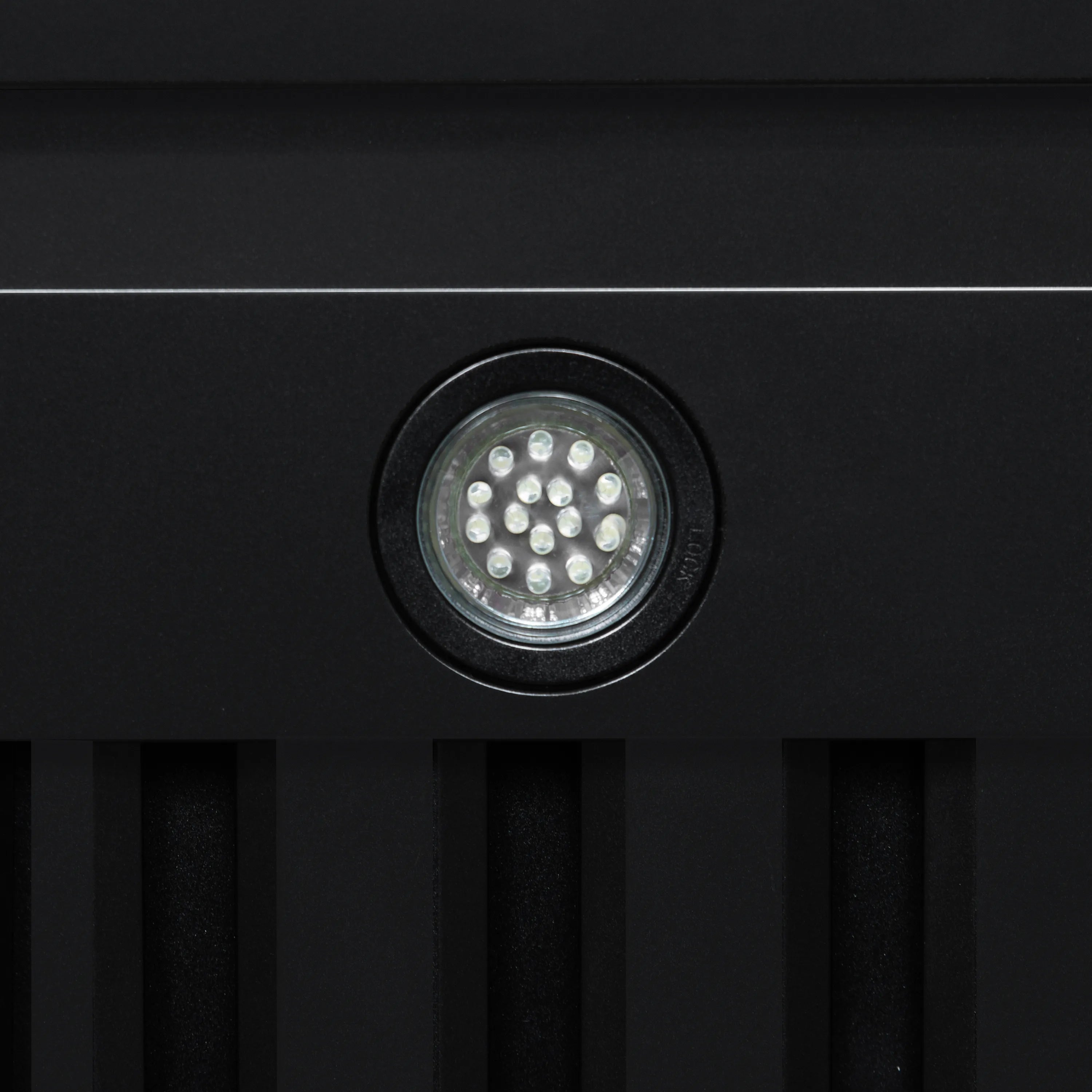 Black range hood LED light module in round housing