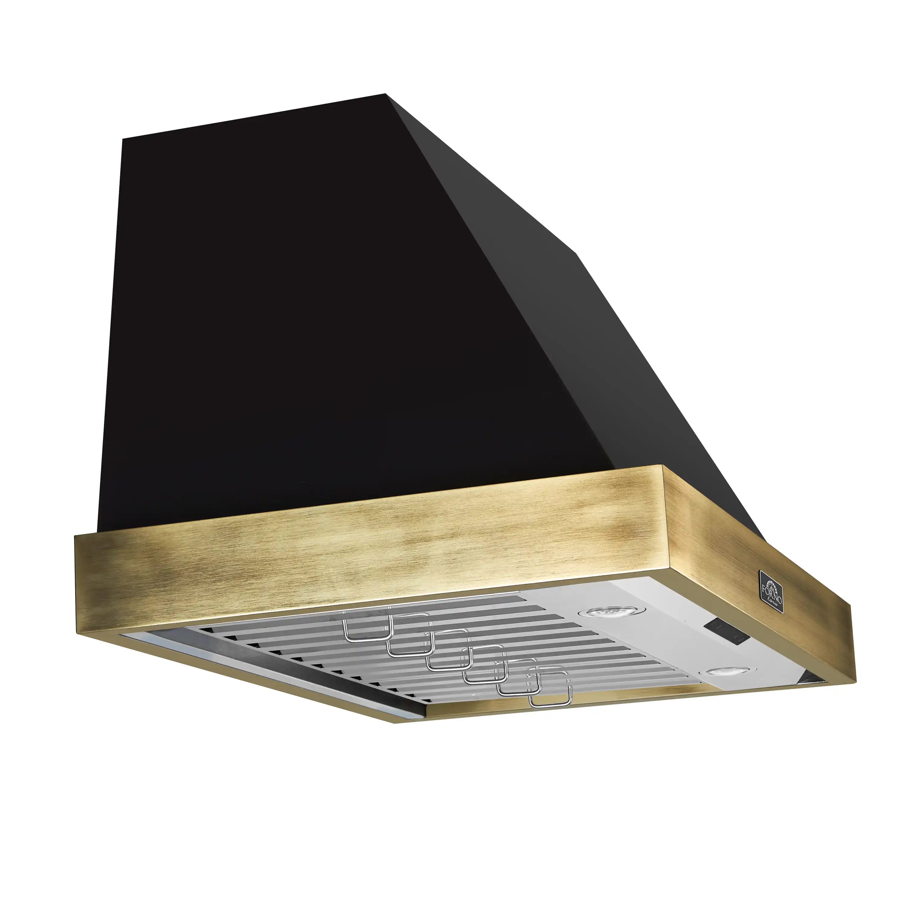 Black range hood with antique-brass border and exposed underside filters, angle view