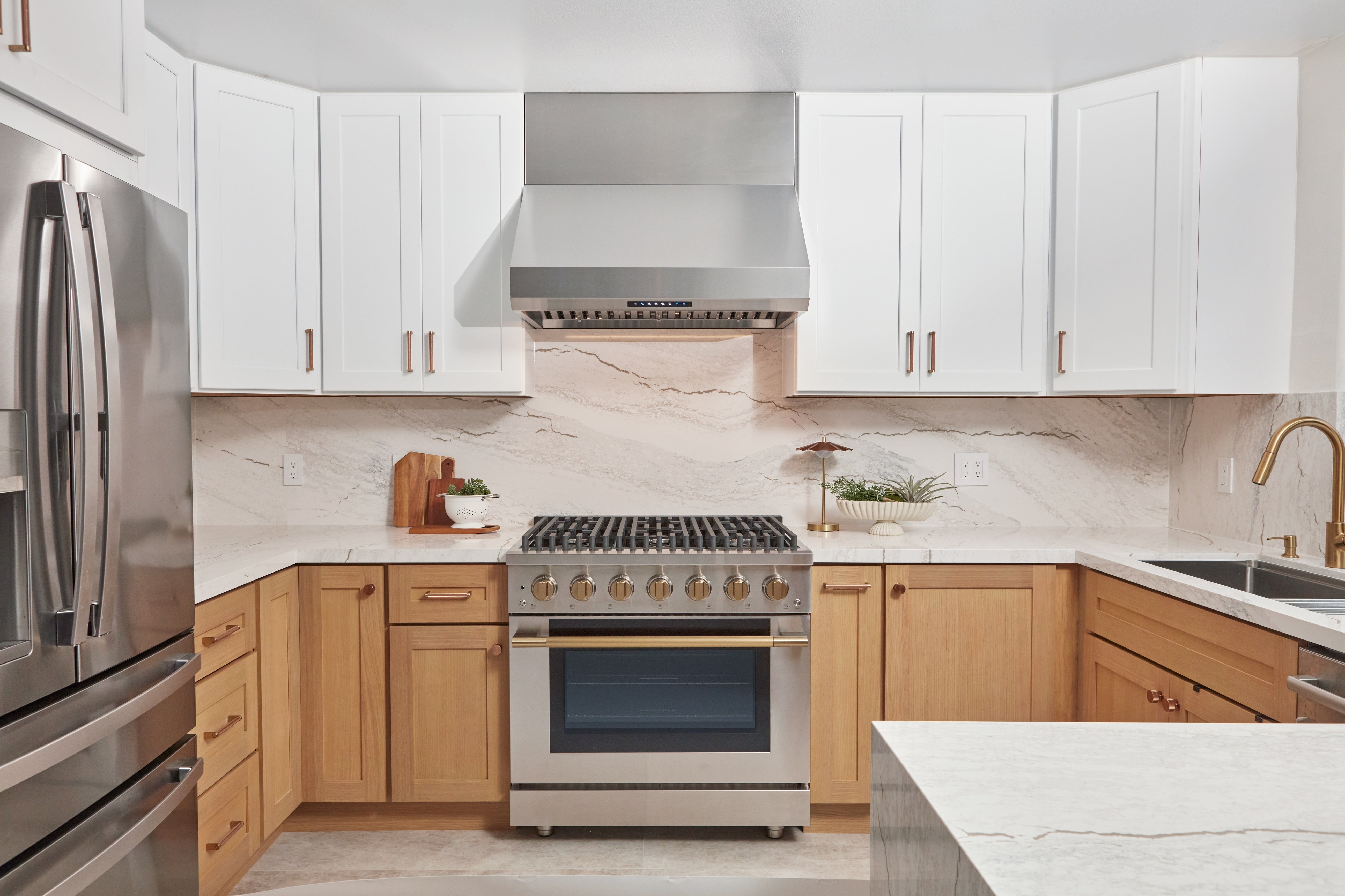 Stainless steel 36-inch gas range with six burners and convection oven door