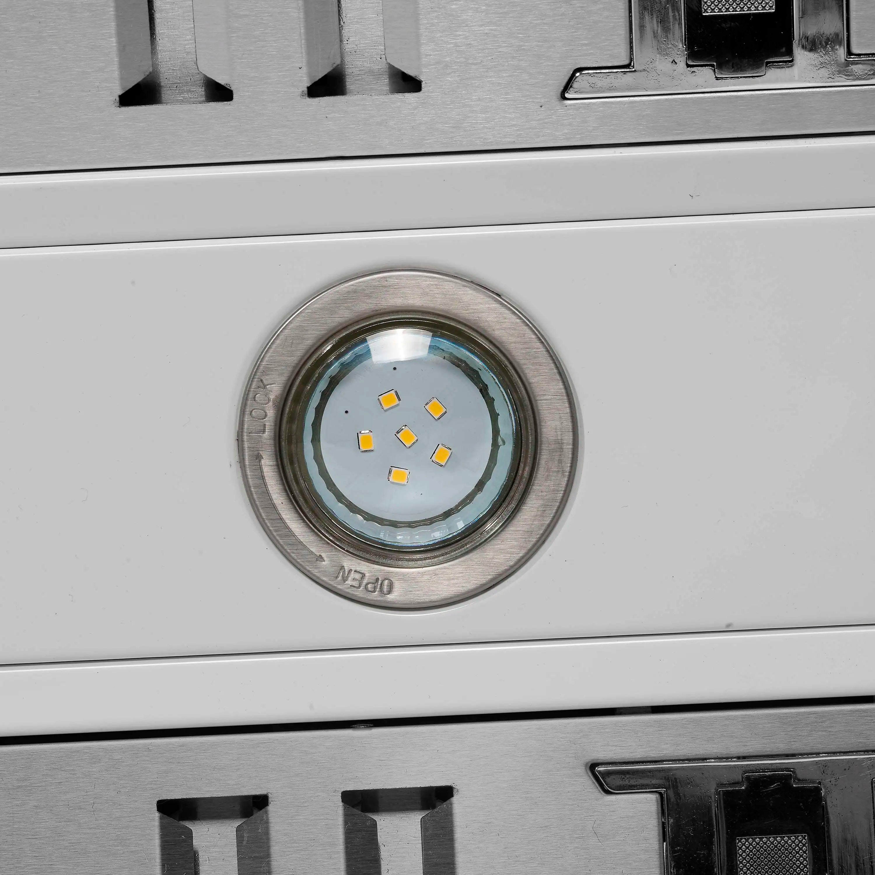 Range hood LED light lens with visible yellow diodes on white housing