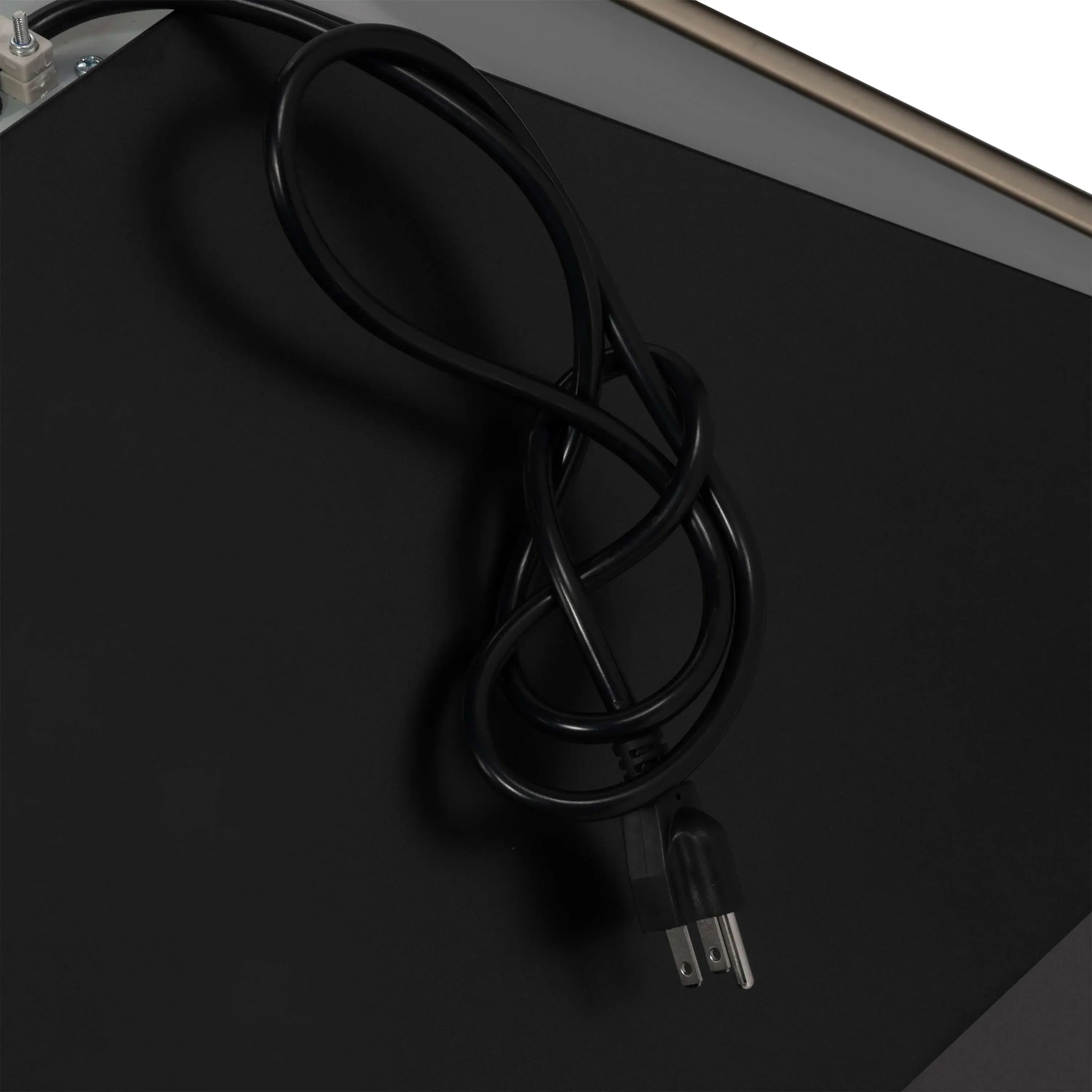 Forno range hood power cord and plug on a black control panel