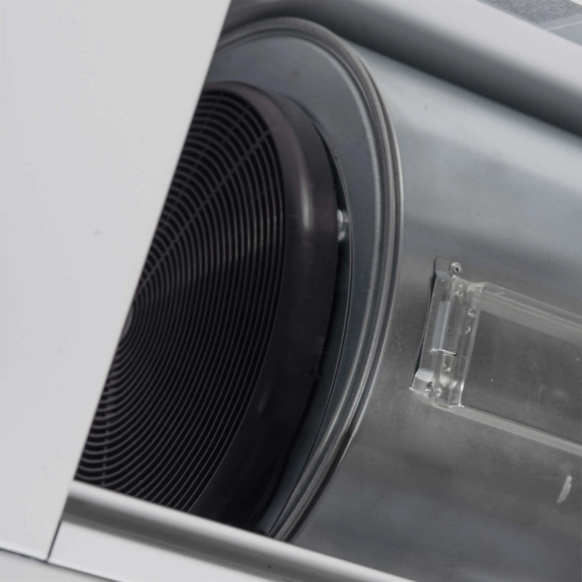Range hood fan unit with black circular blades inside the vent