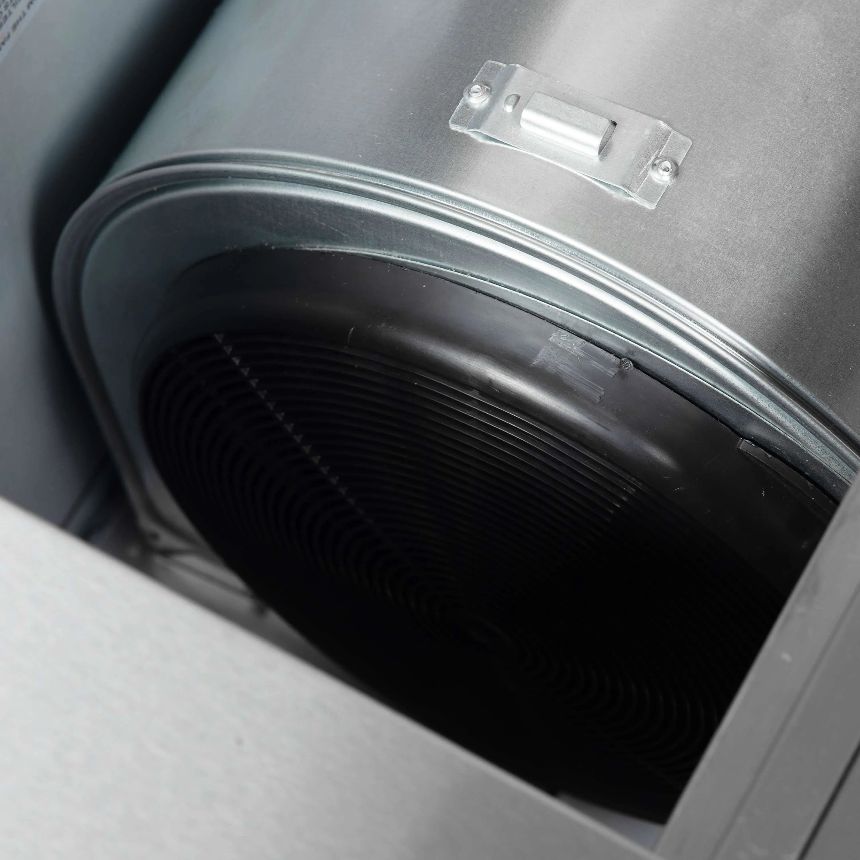 Forno Aria range hood duct opening with flexible rubber collar inside stainless steel