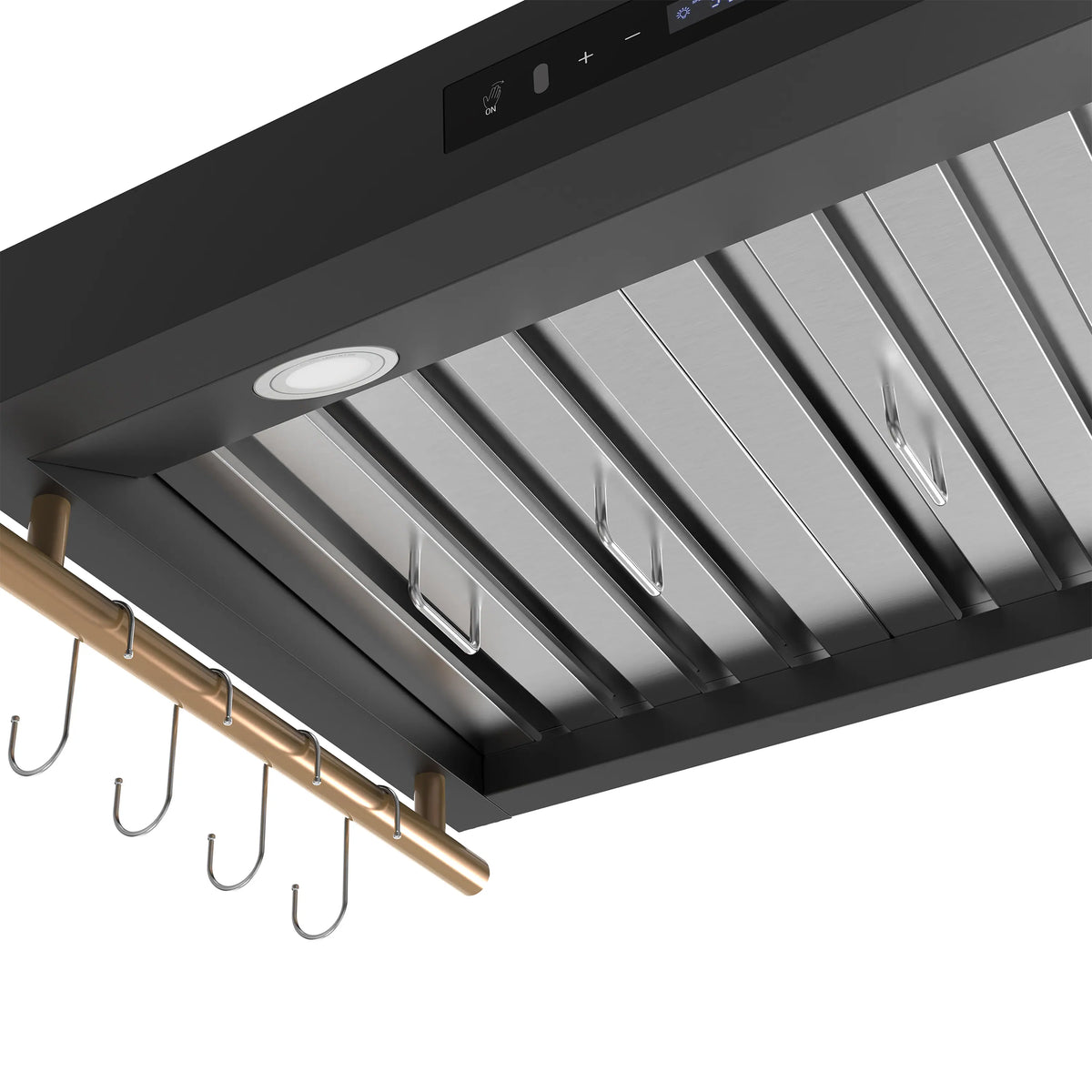 Range hood filter area with stainless baffle filters, round light, and brass hooks