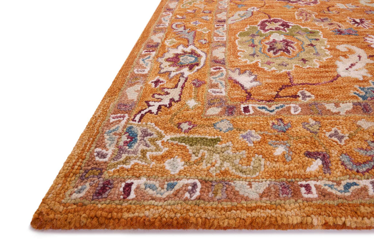 Orange transitional hooked rug with multicolor medallion and border pattern