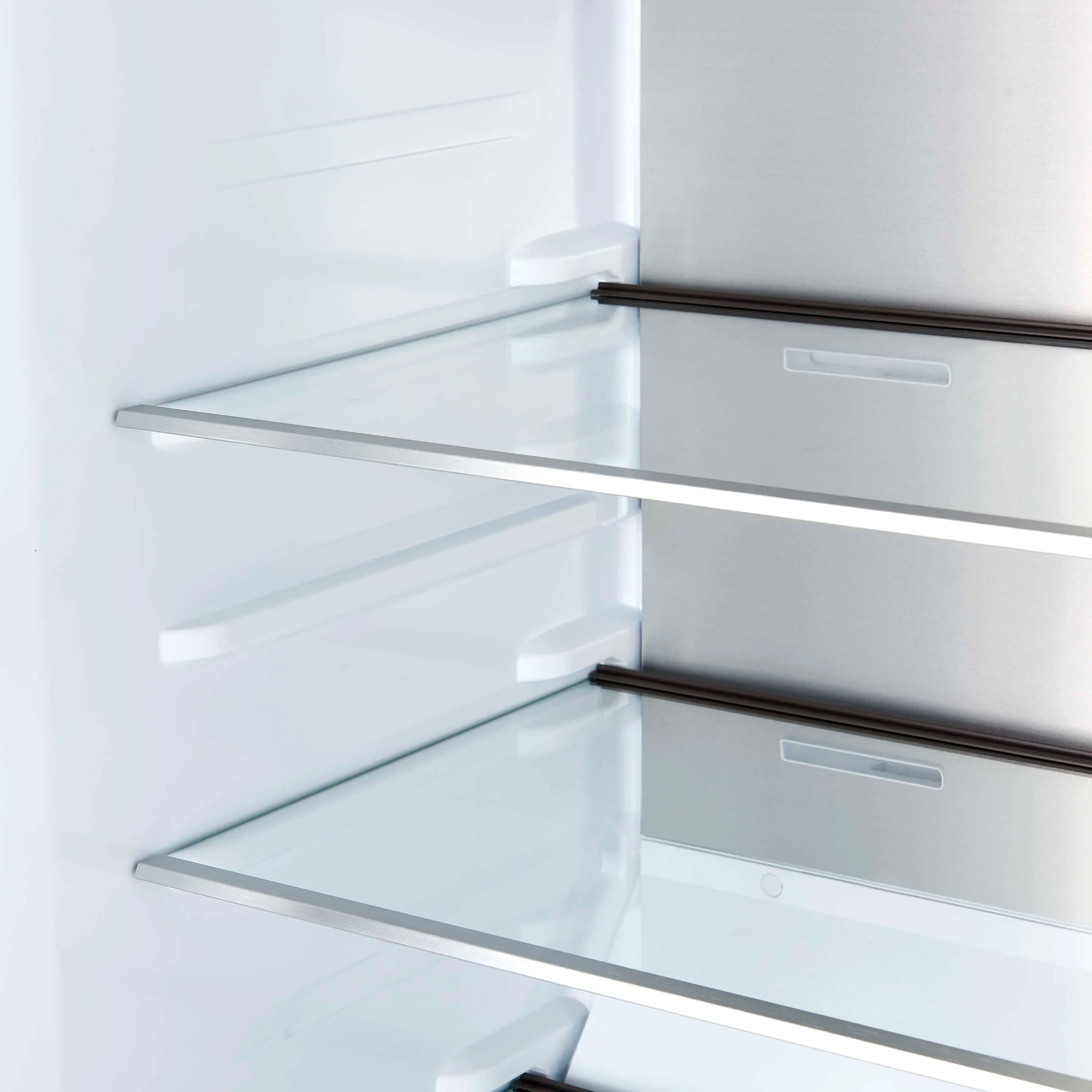 Refrigerator door shelves with clear bins and dark handle trim, white interior