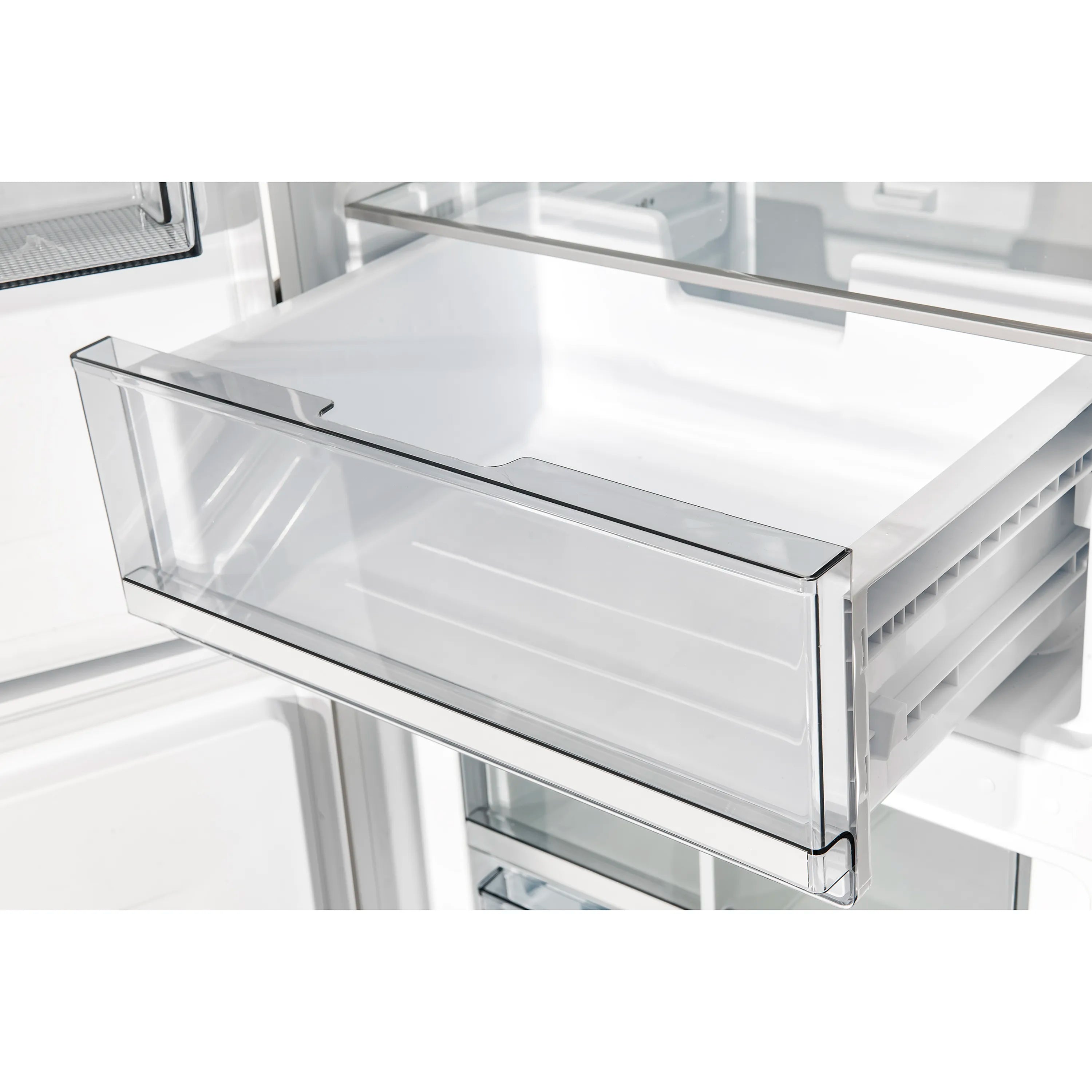 White bottom freezer refrigerator with clear glass top bin and metal trim