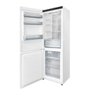 White bottom freezer refrigerator interior with shelves and freezer drawer open