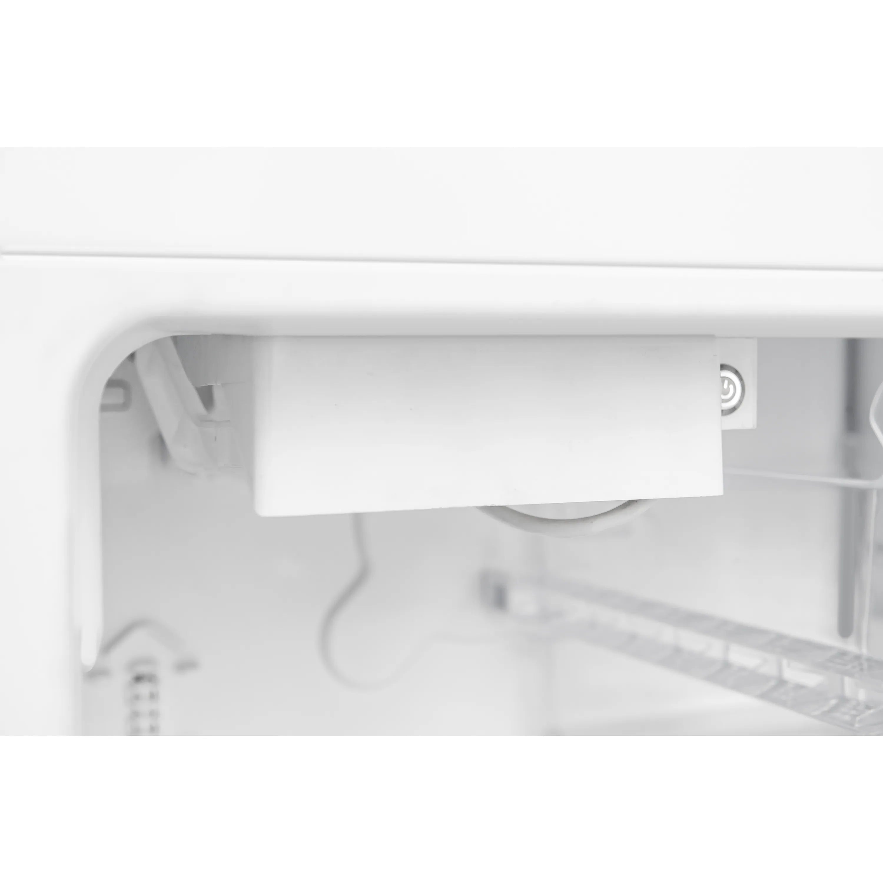 Built-in refrigerator interior shelf with white drawer and storage bins