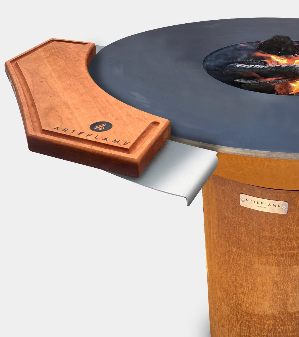 Arteflame XXL grill with black lid, wooden base, and side shelf