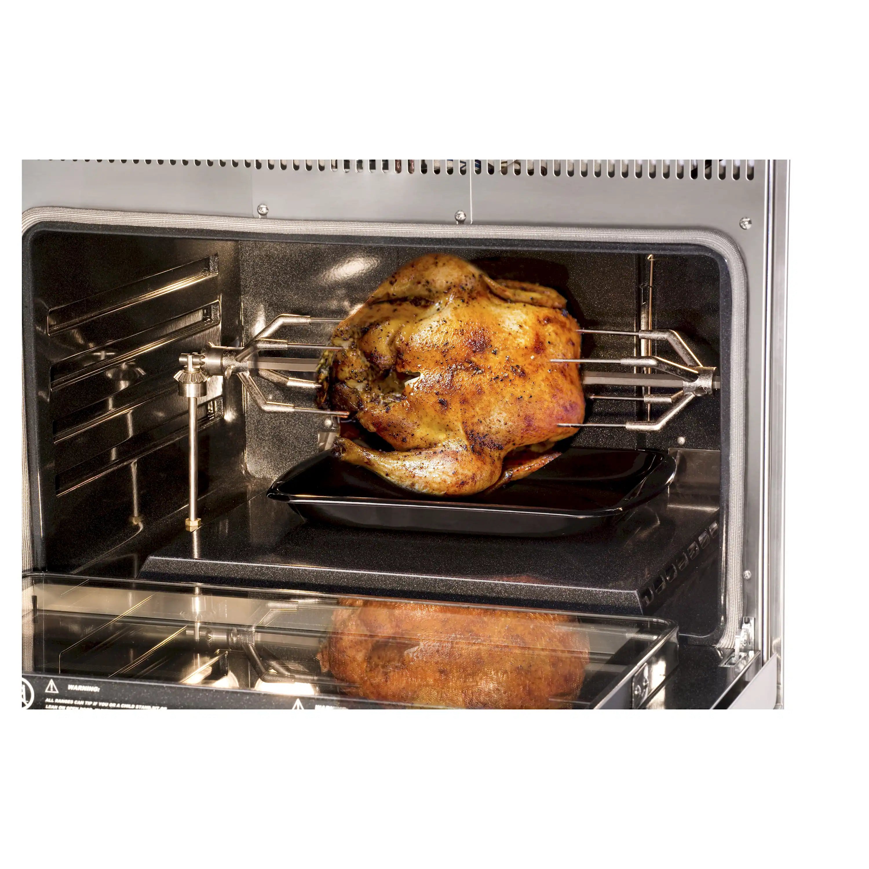 Oven door open, whole roast chicken on rack