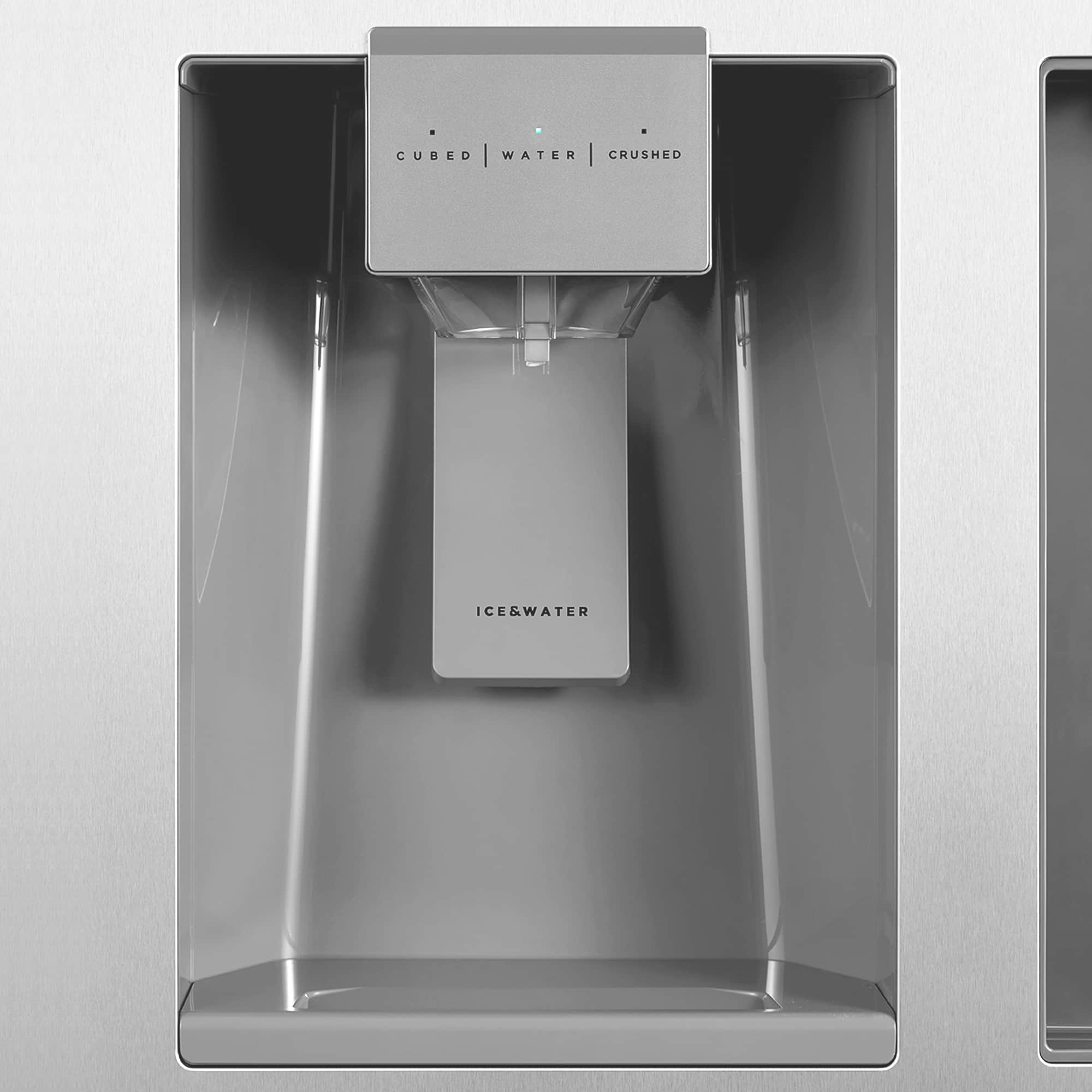 Stainless steel refrigerator top ice and water dispenser chute inside the unit