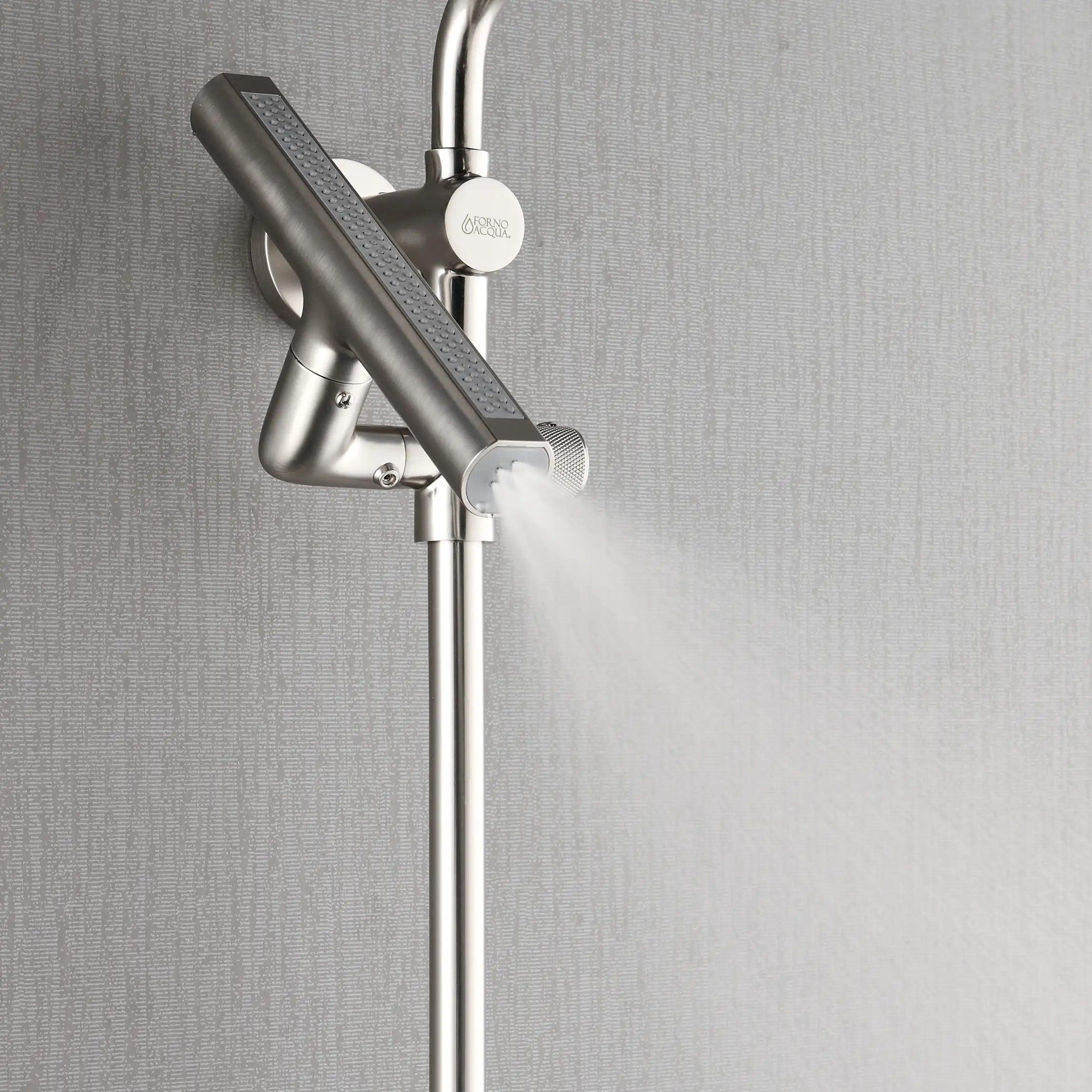 Brushed nickel handheld sprayer on vertical bar with water spray