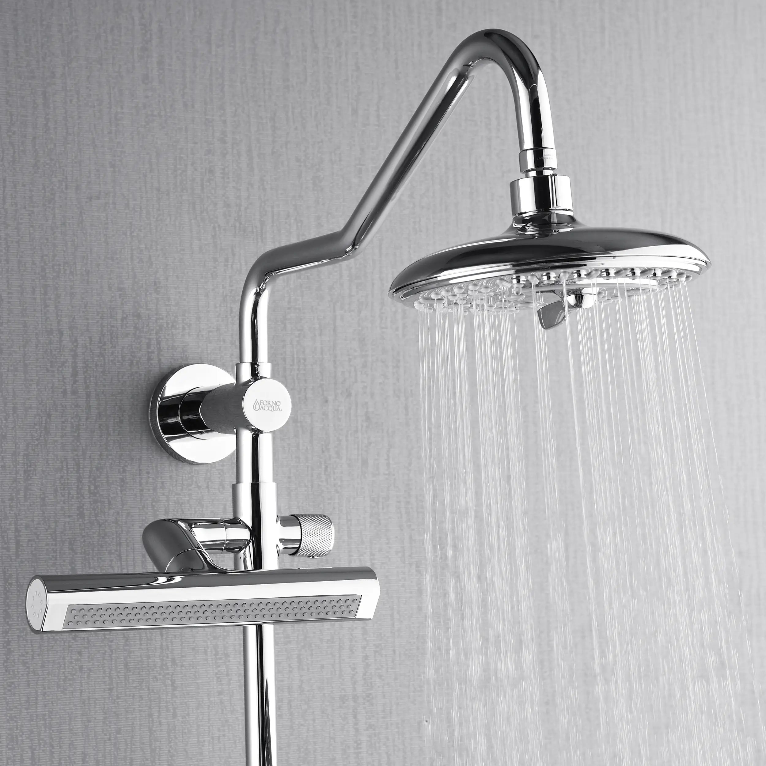 Close-up of overhead rainfall shower head with water stream, polished stainless steel