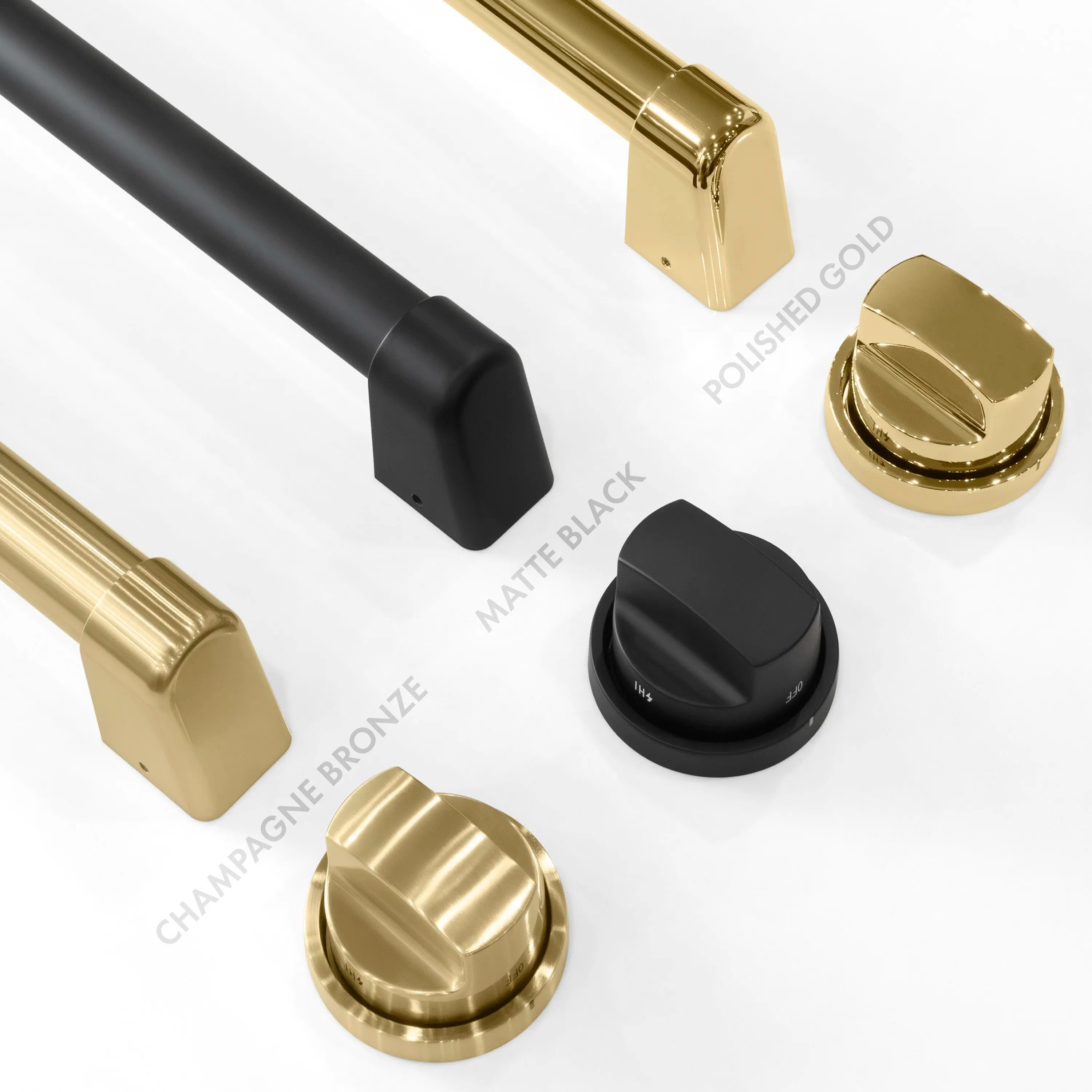 Close-up of champagne bronze knob caps with matte black control stem on range panel