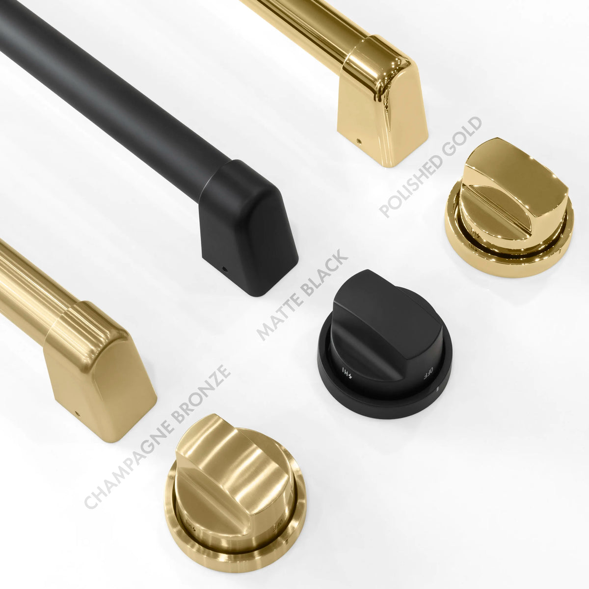 Stainless gas range control knobs with matte black caps and brass trim details