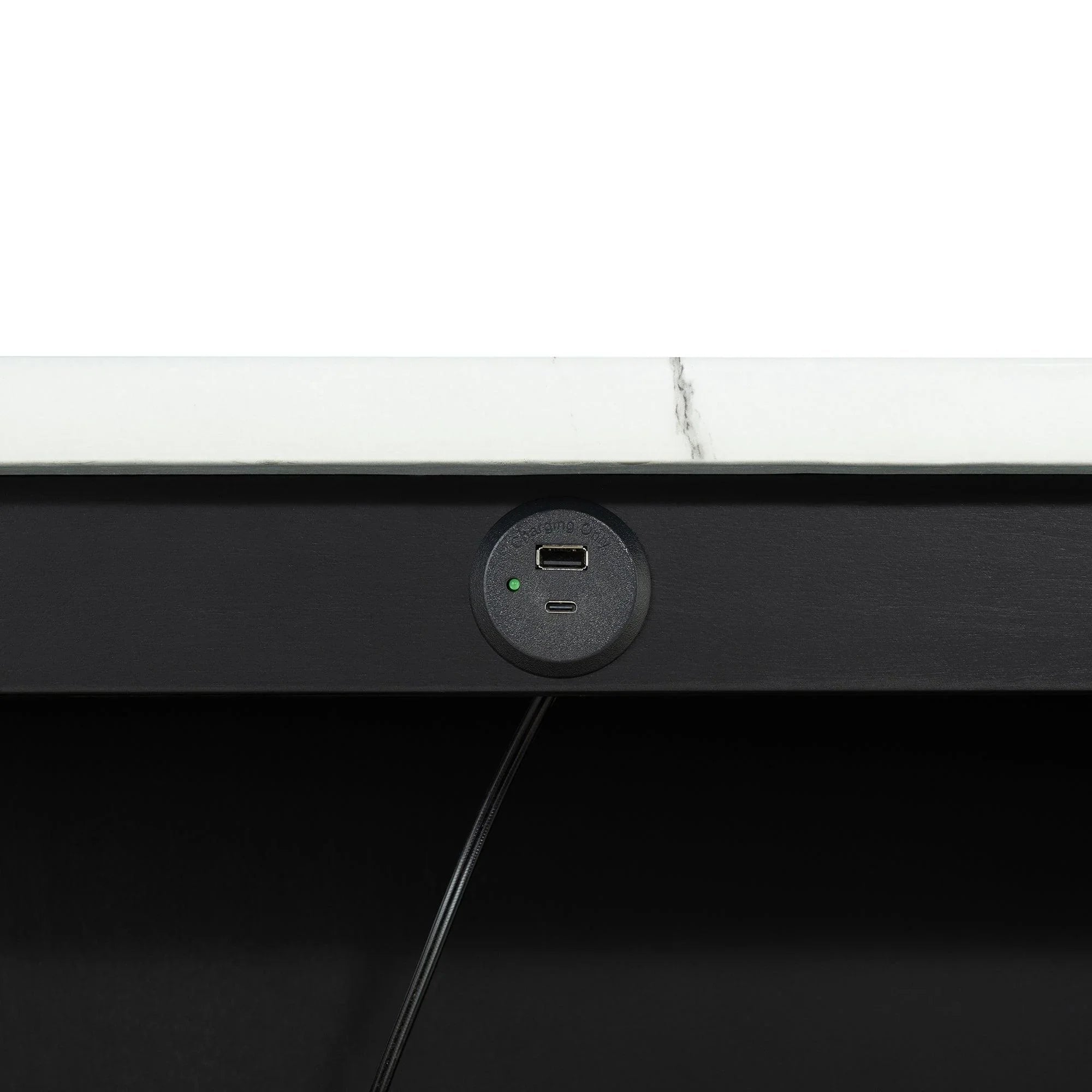 Tabletop charging port with USB connection set into black panel