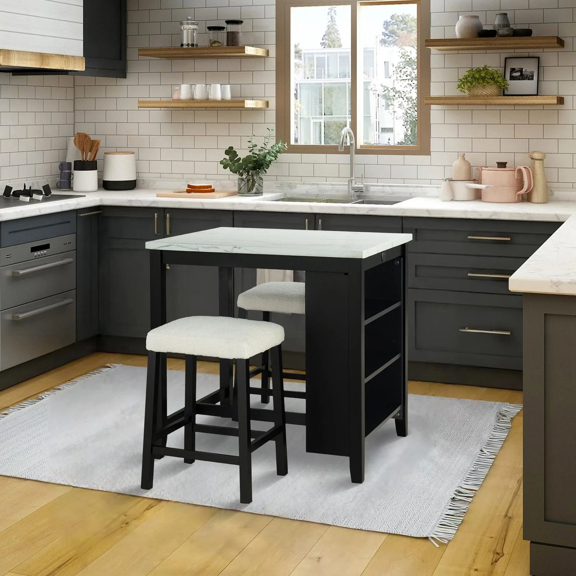 Black dining table set with two stools and white seat cushions in a kitchen setting.