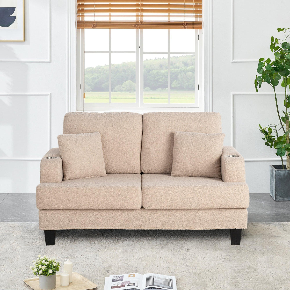 Beige loveseat sofa with three seat cushions and padded armrests