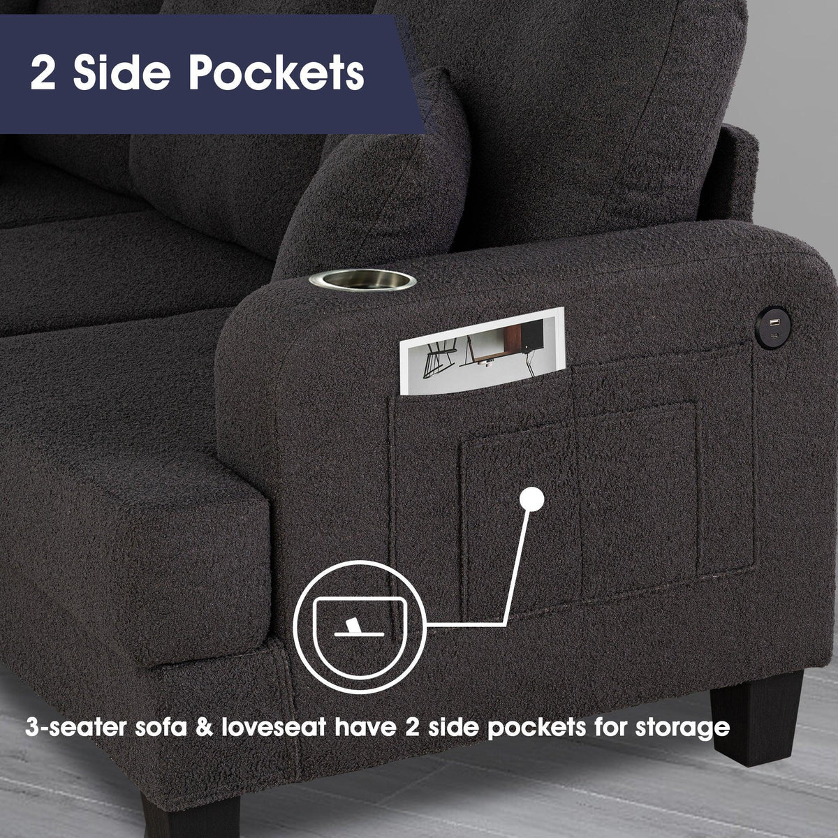Dark gray sofa arm storage pocket with cup holder opening on 3-seater loveseat