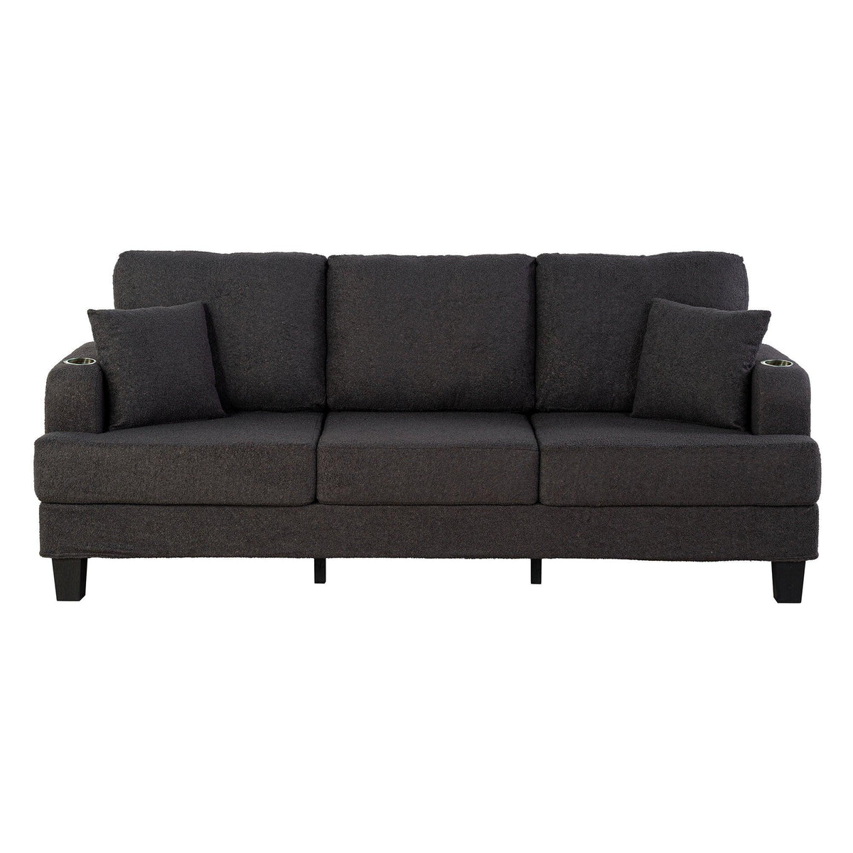 Dark gray 3-seat sofa with tufted back cushions, square arms, and four pillows