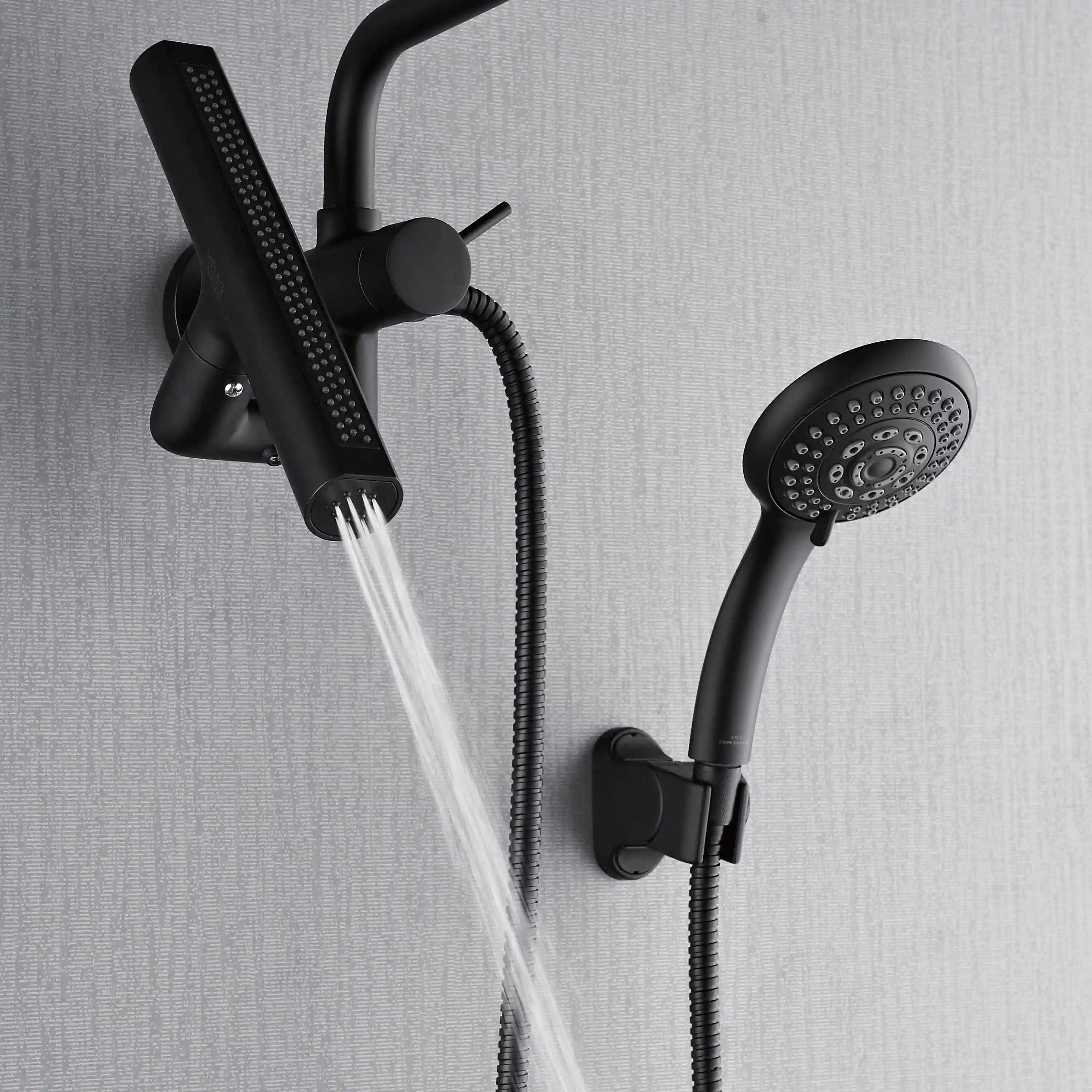 Matte black overhead and handheld shower sprayers with flowing water streams