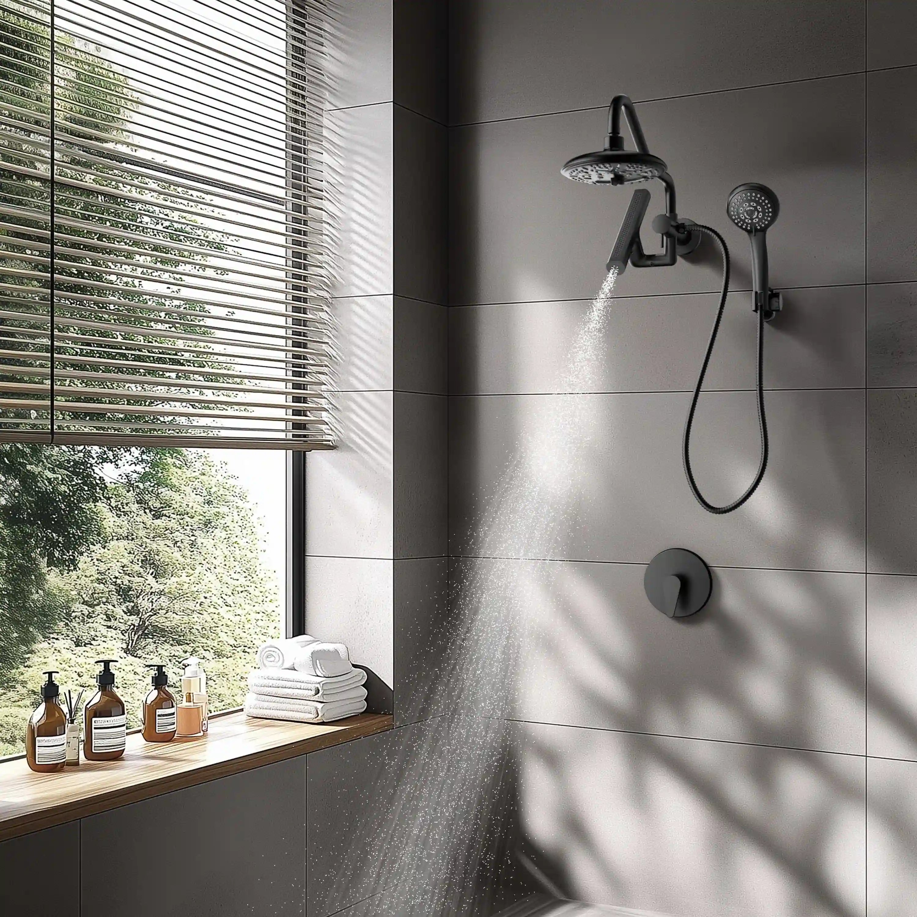 Matte black rainfall shower set on wall with overhead head, handheld, and hose