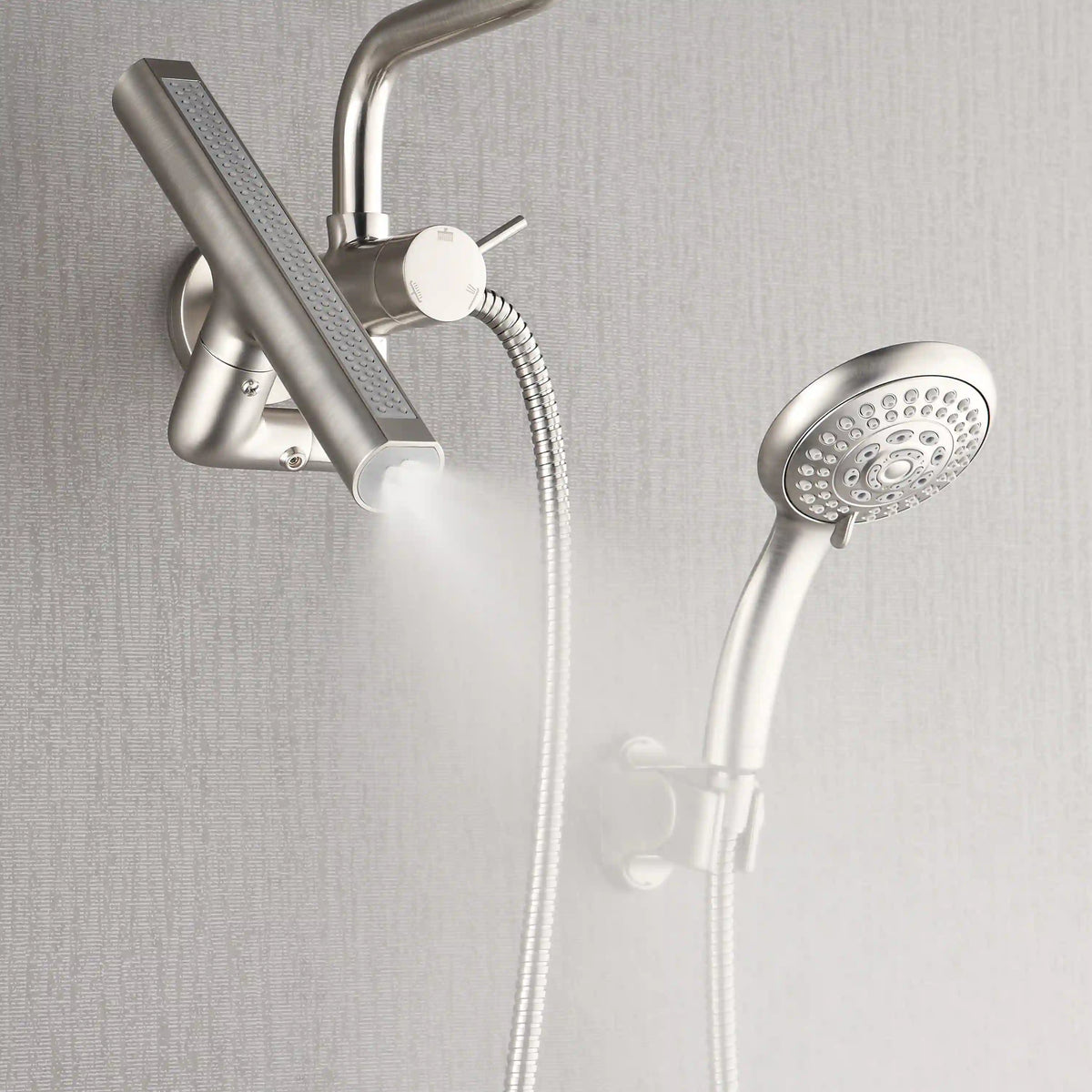 Side view of brushed nickel shower set with rainfall head, handheld sprayer, and hose