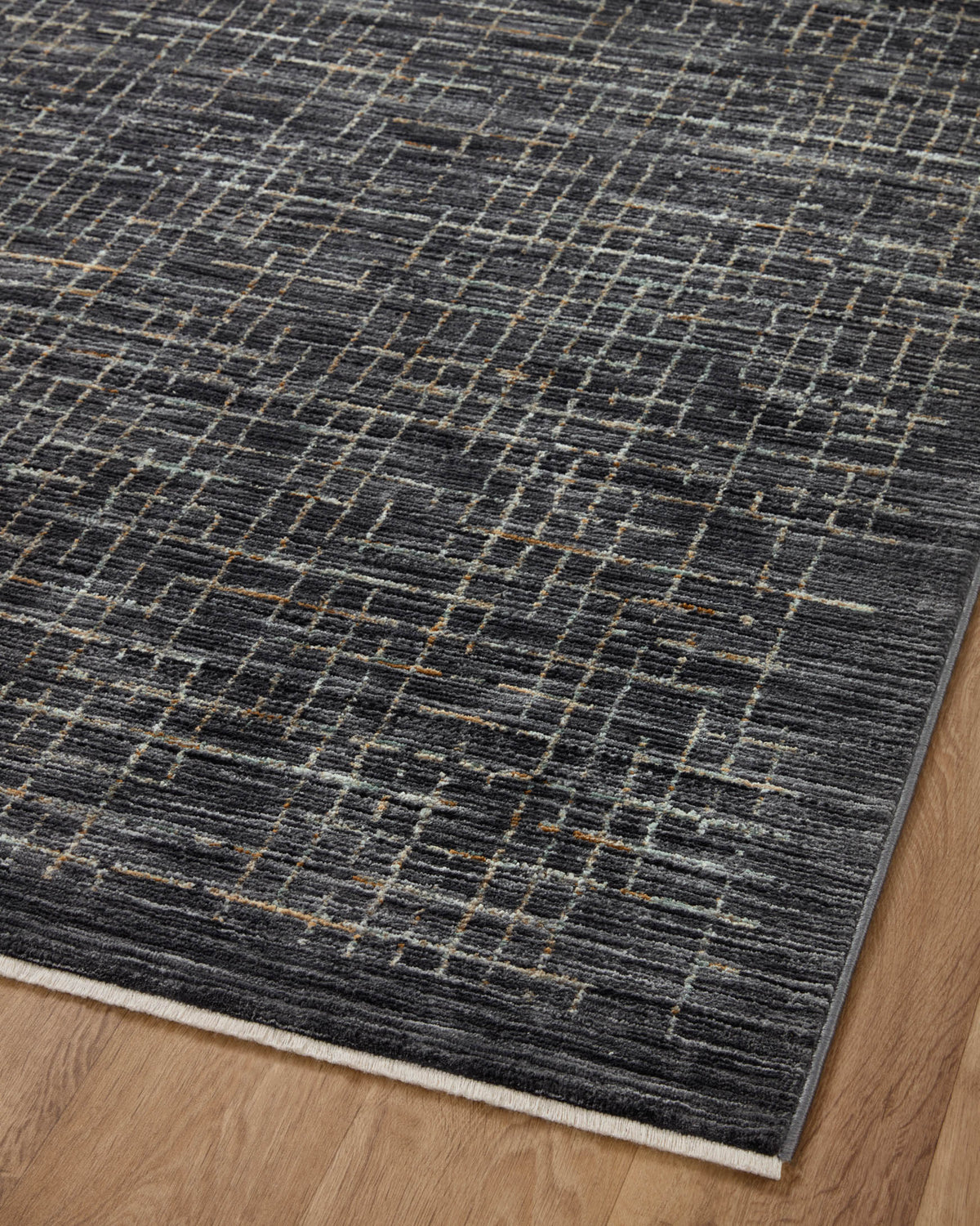 Full runner rug view with dark gray field and silver grid lines; minimal distressed texture