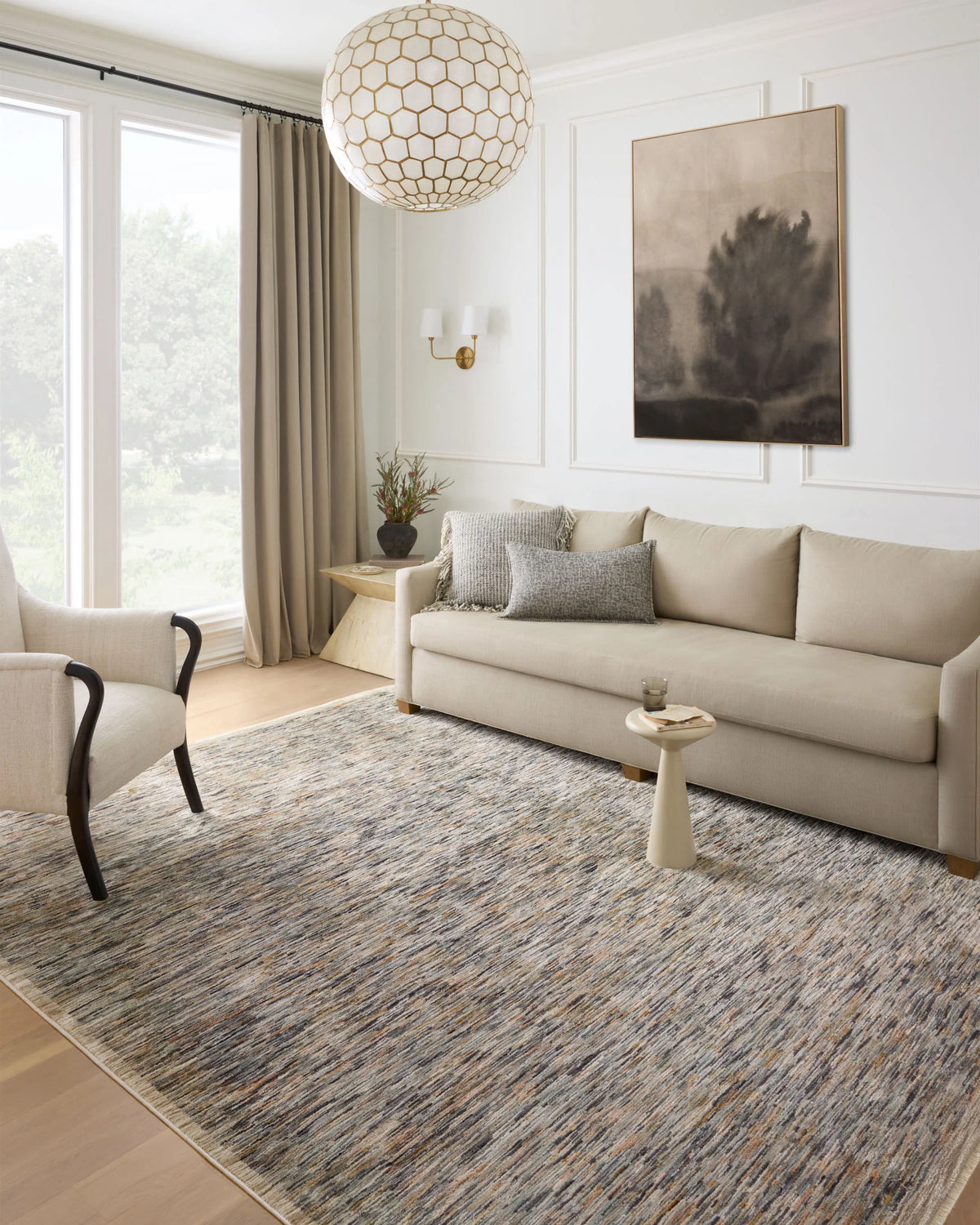 Accent rug in beige and blue-gray with mottled linear stripe pattern