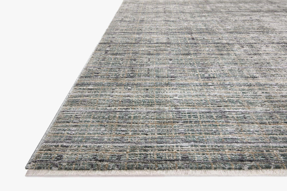 Accent rug with light gray, blue, and green stripe-textured weave