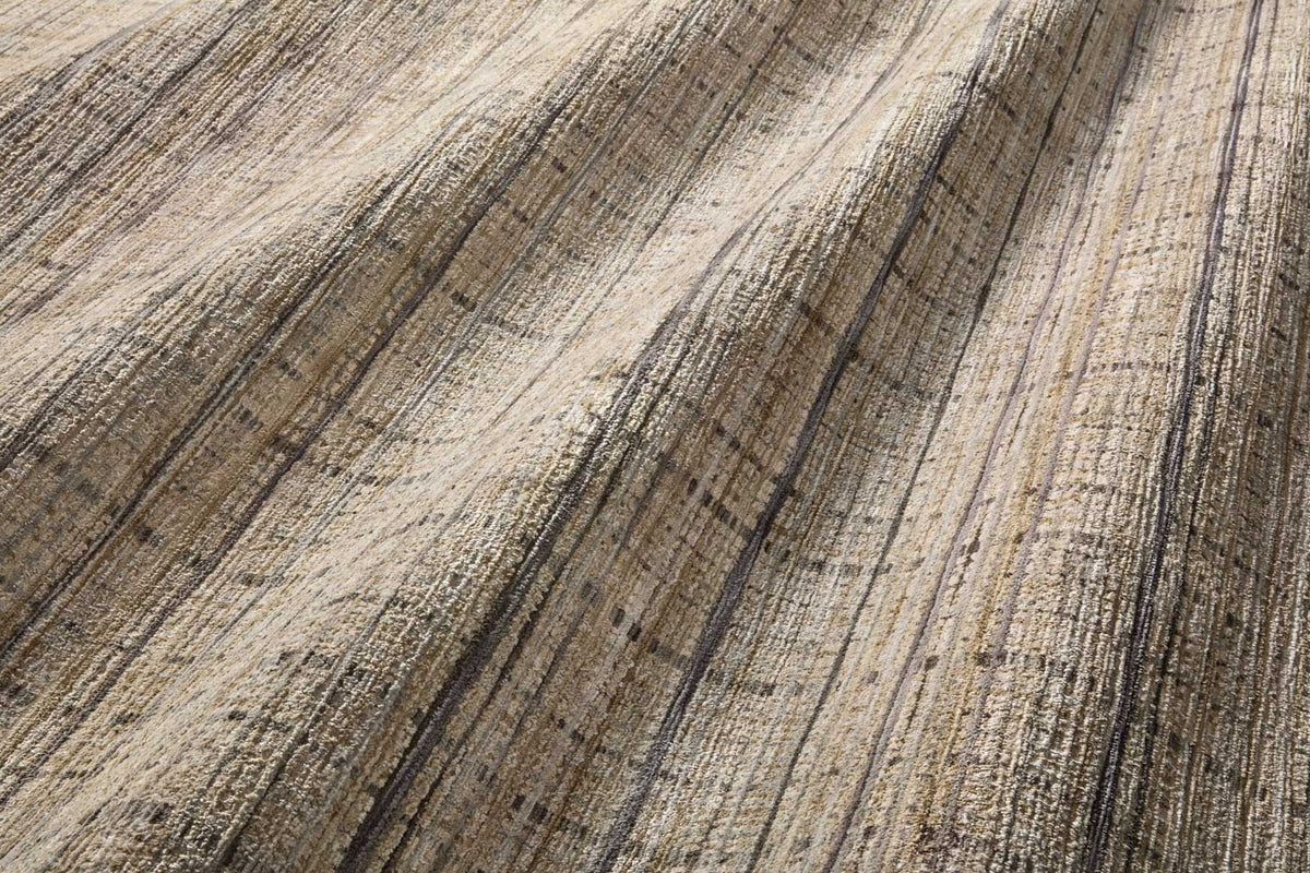 Close-up pebble and charcoal rug texture with fine horizontal and vertical stripe lines
