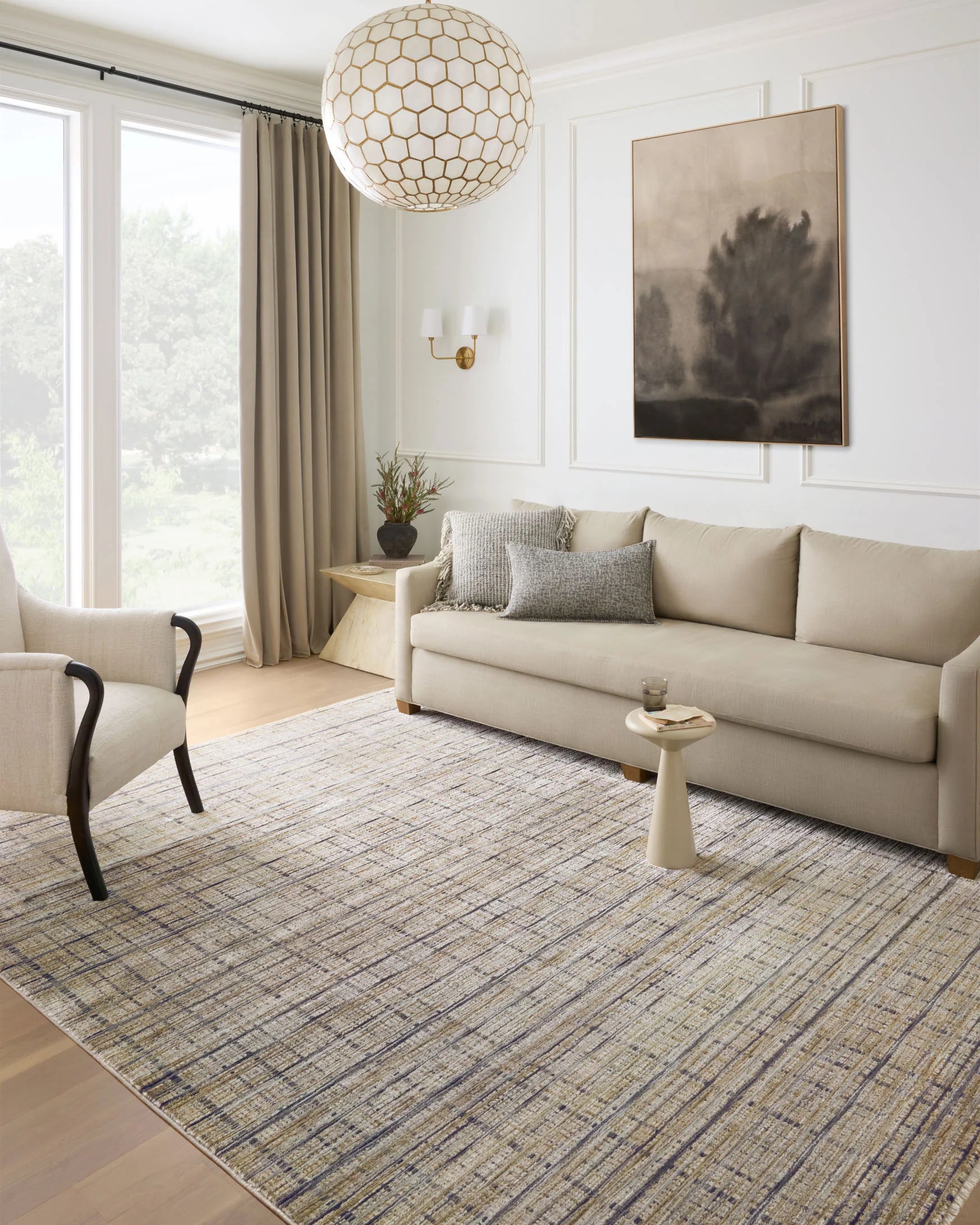 Indoor runner rug with textured pattern in beige, blue-gray, and dark charcoal tones