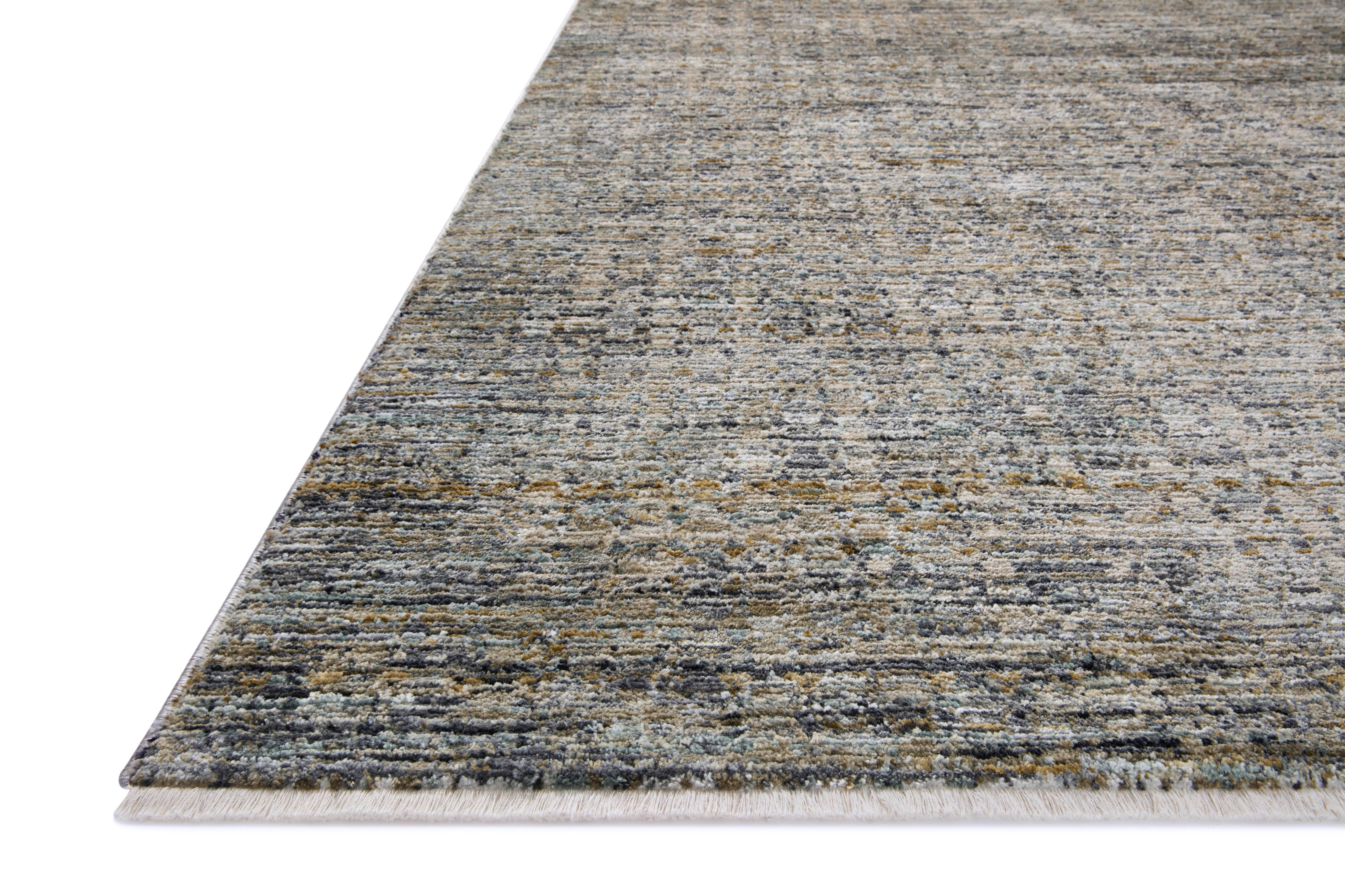 Corner view of charcoal and cream flat weave area rug with textured pattern and border
