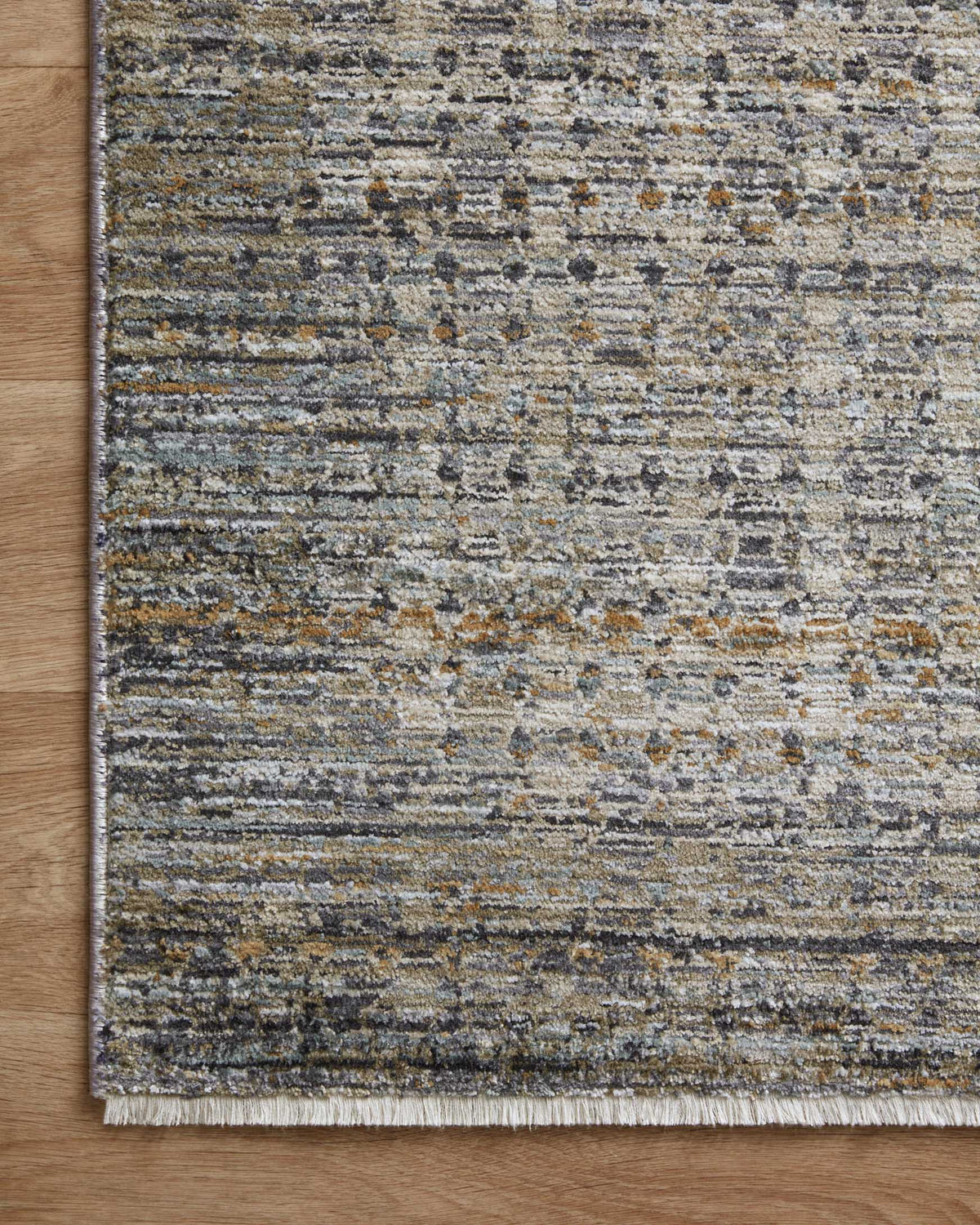 Mottled charcoal area rug with flat border and flatweave surface