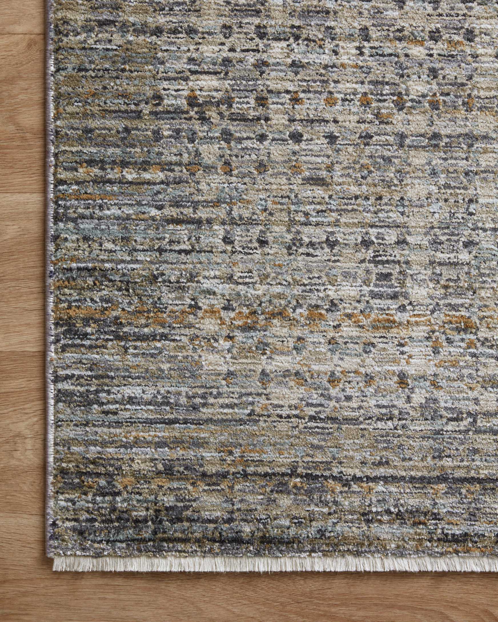 Charcoal and gray runner rug with beige-and-gold flecked pattern and bound perimeter